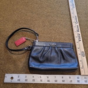 Black leather wristlet clutch Coach red hang tag